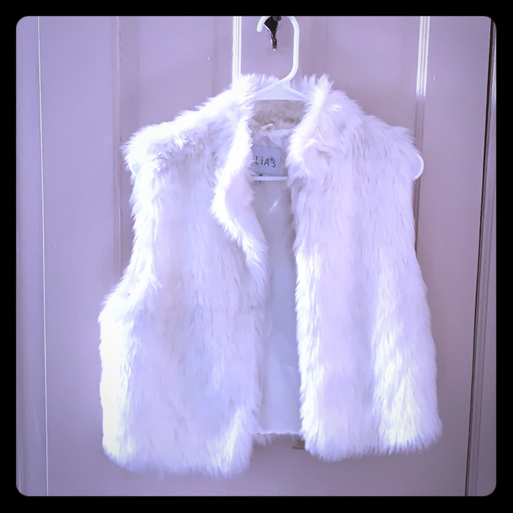 White faux fur vest